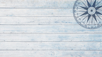 Maritimer Kompass auf Holz-Hintergrund - 130729137