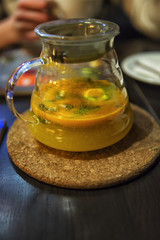 glass teapot, orange tea