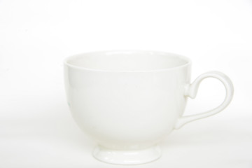 White cup on white background.