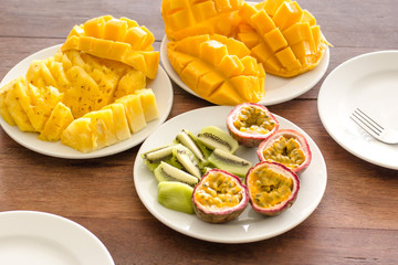 Fruit mix on a white plate with natural lighting