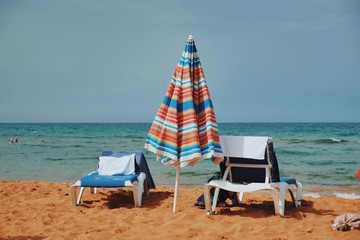 chairs and umbrella on the beach