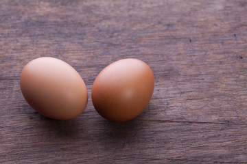Eggs on wooden background