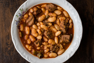 Turkish Etli Kuru Fasulye /  Baked Beans  with meat. (closeup view)