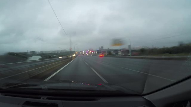 Points of view on road from car. Outside of city. Cloudy. Rain. Time lap.
