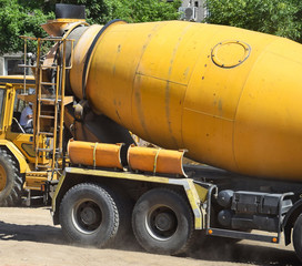 Cement mixer truck at the construction site