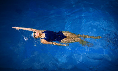 Young woman swimmer