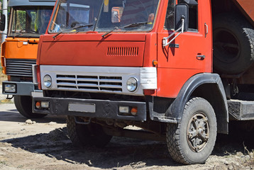 Old trucks at the construction site