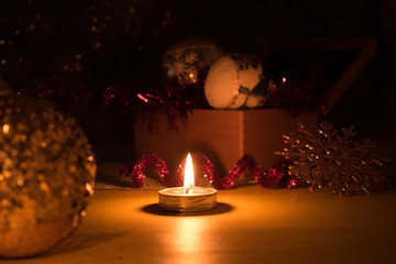 Christmas decorations and toys by candlelight