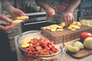 Cooking baked meat with potatoes  and vegetable