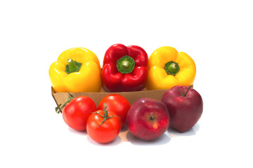 Warm tone of assortment organic Vegetables, bell peppers, tomatoes and red Apples Grown with natural isolated