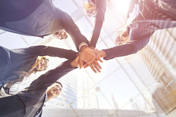 Half Circle People Hand Assemble Corporate Meeting Teamwork Concept with high buildings background
