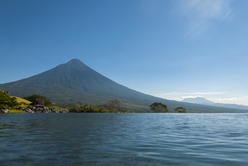 Pool in golf Club in Guatemala and volcano