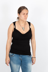 Fototapeta premium Beautiful woman doing different expressions in different sets of clothes: wink