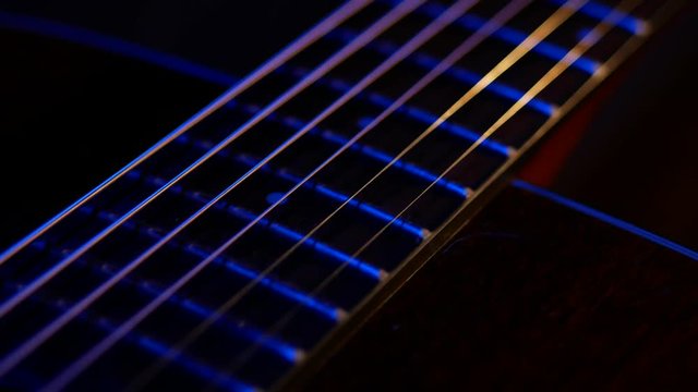 Wooden Guitar isolated on dark background