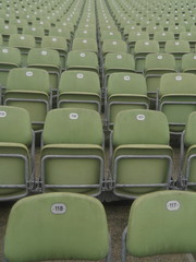 Fototapeta premium empty stadium chairs bad weather