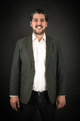 Handsome man doing different expressions in different sets of clothes: smile