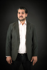 Fototapeta premium Handsome man doing different expressions in different sets of clothes: love