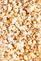 Popcorn textured background close up macro.