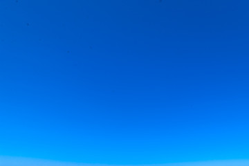 Blue background - Smooth Sunny summer blue sky.