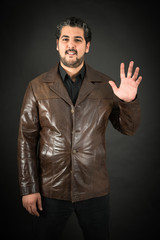 Handsome man doing different expressions in different sets of clothes: wave