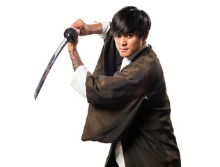 Asian samurai man with katana © luismolinero