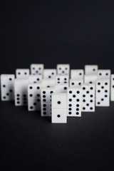 dominoes leader buissnes concept on black background