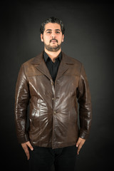 Handsome man doing different expressions in different sets of clothes: at attention