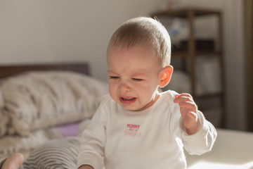 Crying little baby, 8 months old