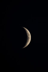Obraz na płótnie Canvas half moon telescope zoom black background