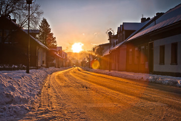Słoneczny zimowy dzień w górskim mieście Muszyna. Sunny winter day in the mountain in Muszyna - Poland.
