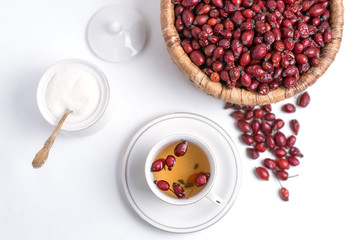tea from rosehip on a white background