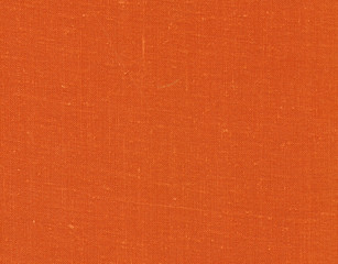 Fototapeta premium Orange color textile cloth texture.