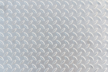 Industrial shiny metal silver list with rhombus shapes, Seamless metal texture, Table of steel sheet.