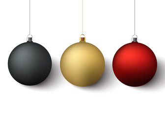 Set of three christmas balls with shadows on white background.