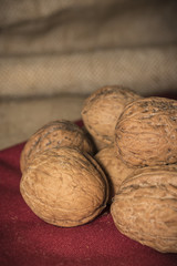 walnuts on red background material texture