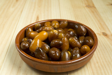 Dates in a clay pot.