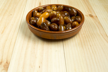 Dates in a clay pot.