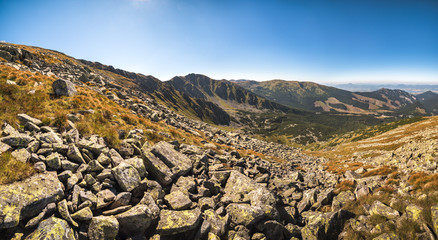 Panoramic View of Mountain Landscape on Sunny Day with Rocks in Foreground. Mount Derese, Low Tatras Mountain, Slovakia.