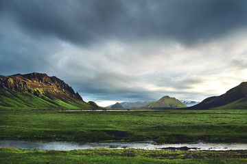 Travel to Iceland. Beautiful Icelandic landscape with mountains, sky and clouds. Trekking in...