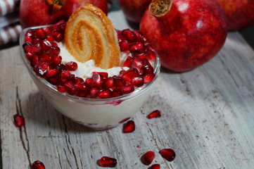 white cream cheese foster pomegranate seeds