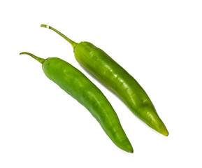 Colorful chili peppers on a white background