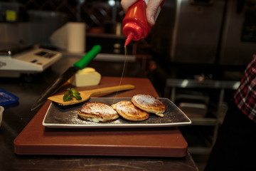 Fototapeta premium pancakes in a frying pan