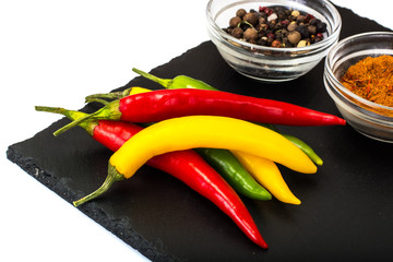 Chile on a black stone plate