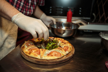 Chef making a pizza