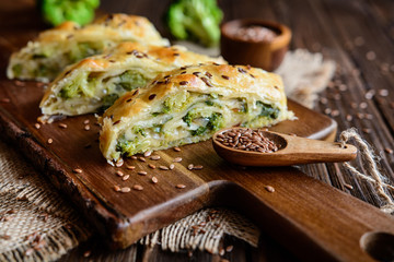 Savory strudel stuffed with broccoli, Mozzarella cheese and onion