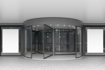 Glass doors of corporate building with posters