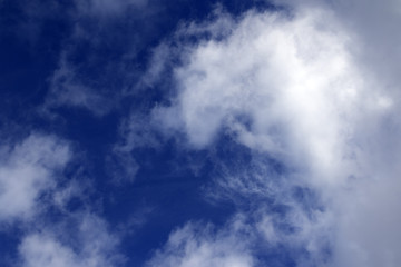 Fototapeta na wymiar Blue sky with sunlight clouds in evening