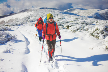 Two girls with a dog.