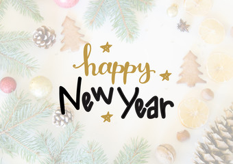 Christmas and New Year cookies, fir branches and pine cones flat lay background