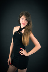 Fototapeta premium Beautiful woman doing different expressions in different sets of clothes: love